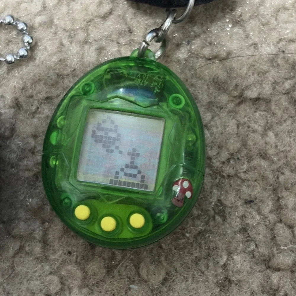Bandai Tamagotchi Clear Green  Working And Purple Needs Battery